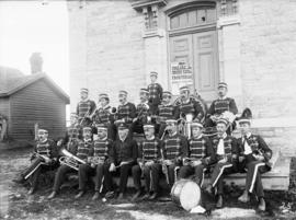 [Wolfe Island Band Sitting With Instruments]